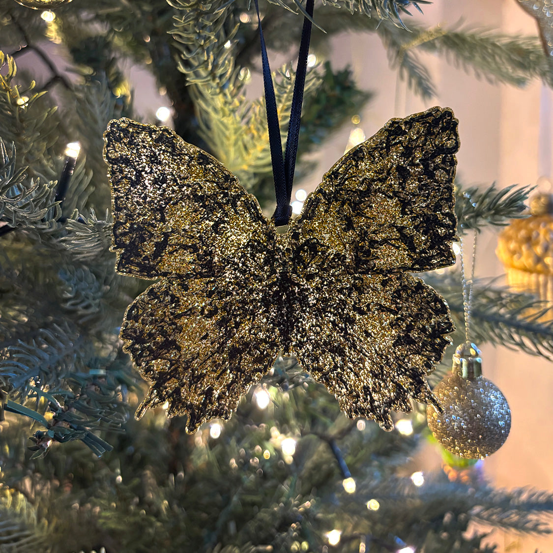 Deliverance Gold Glitter Ornament